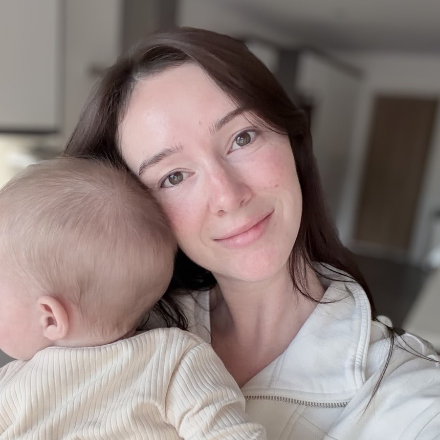 Olivia, baby sleep consultant, cuddling a baby on her shoulder